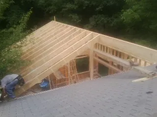 Framing a new roof addition that ties into an existing shingle roof in Mc Sherrystown